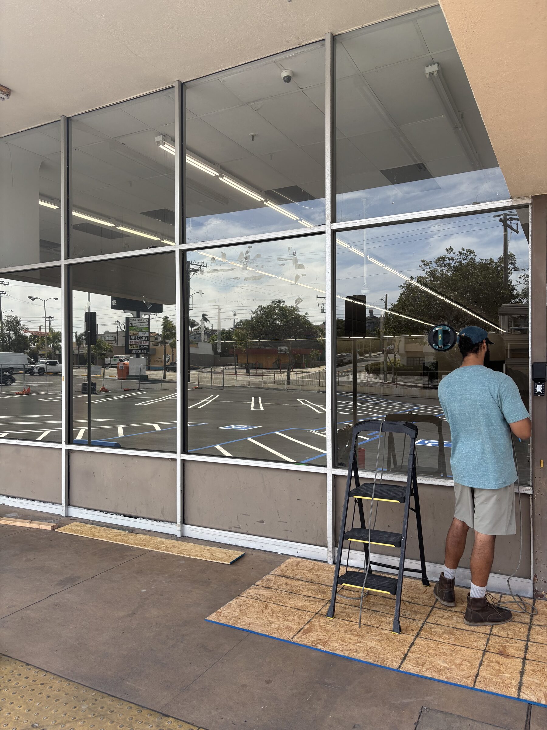 Stillmark Construction at work — commercial glazing install