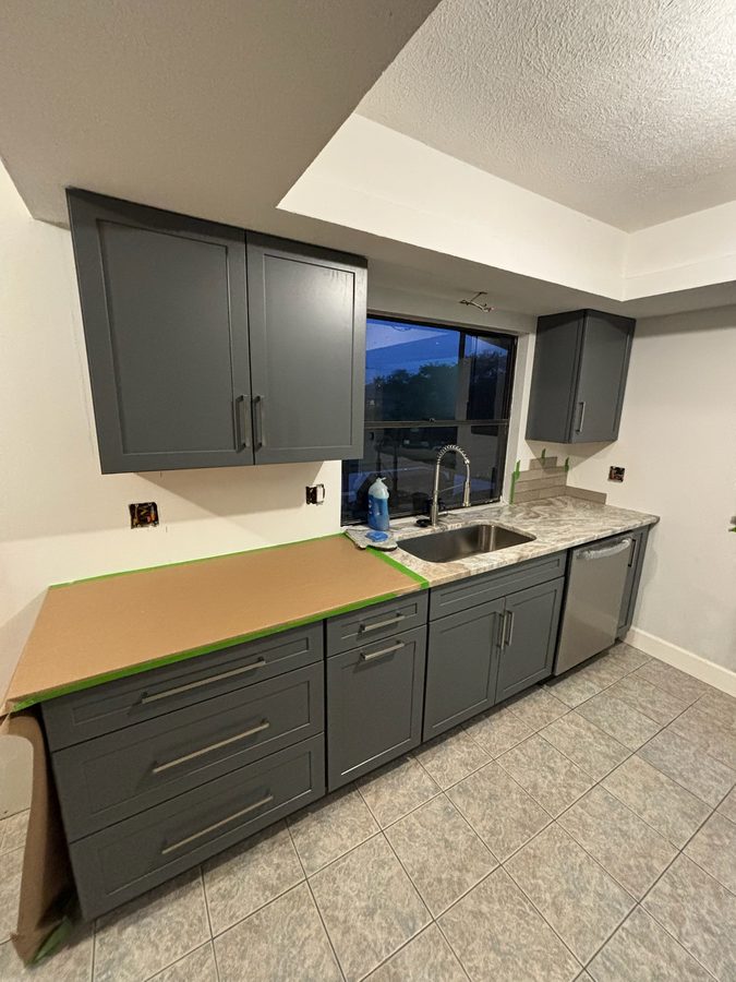 Kitchen cabinet installation and property repair